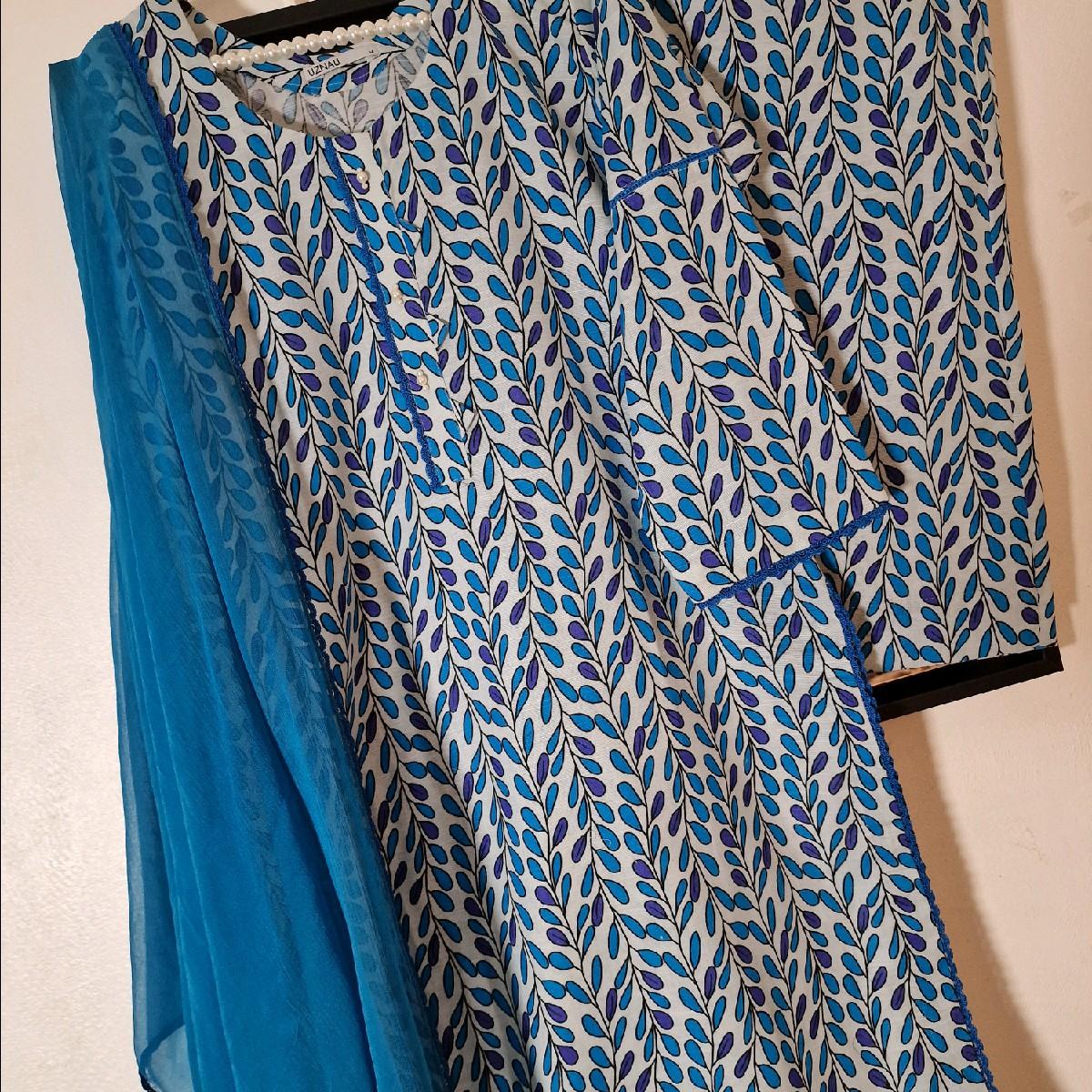 Uznau khaddar printed pakistani winter shalwar kameez