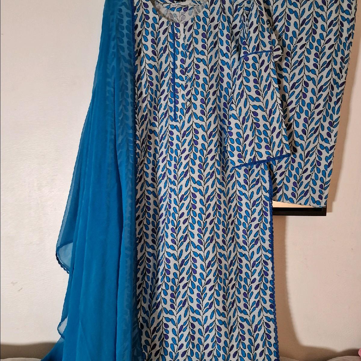 Uznau khaddar printed pakistani winter shalwar kameez